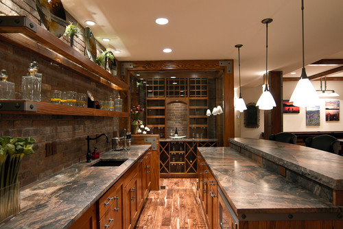 Leathered Capalavaro Granite with Abundant Recess Lights and Pendant Lights, veneer brick backsplash, clear alder wood cabinets with a Burnt alder stain with natural finish Acacia wood flooring